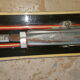 Old skis wooden and its pair of sticks