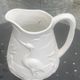 Carafe the heron in white glazed ceramic slipware.