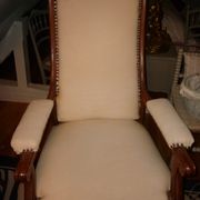 Armchair and its footrest