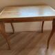 Folding game table in Louis XV style in cerused oak with cabriole legs.