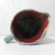 Antique turquoise Art Deco majolica pitcher vase with a snake motif