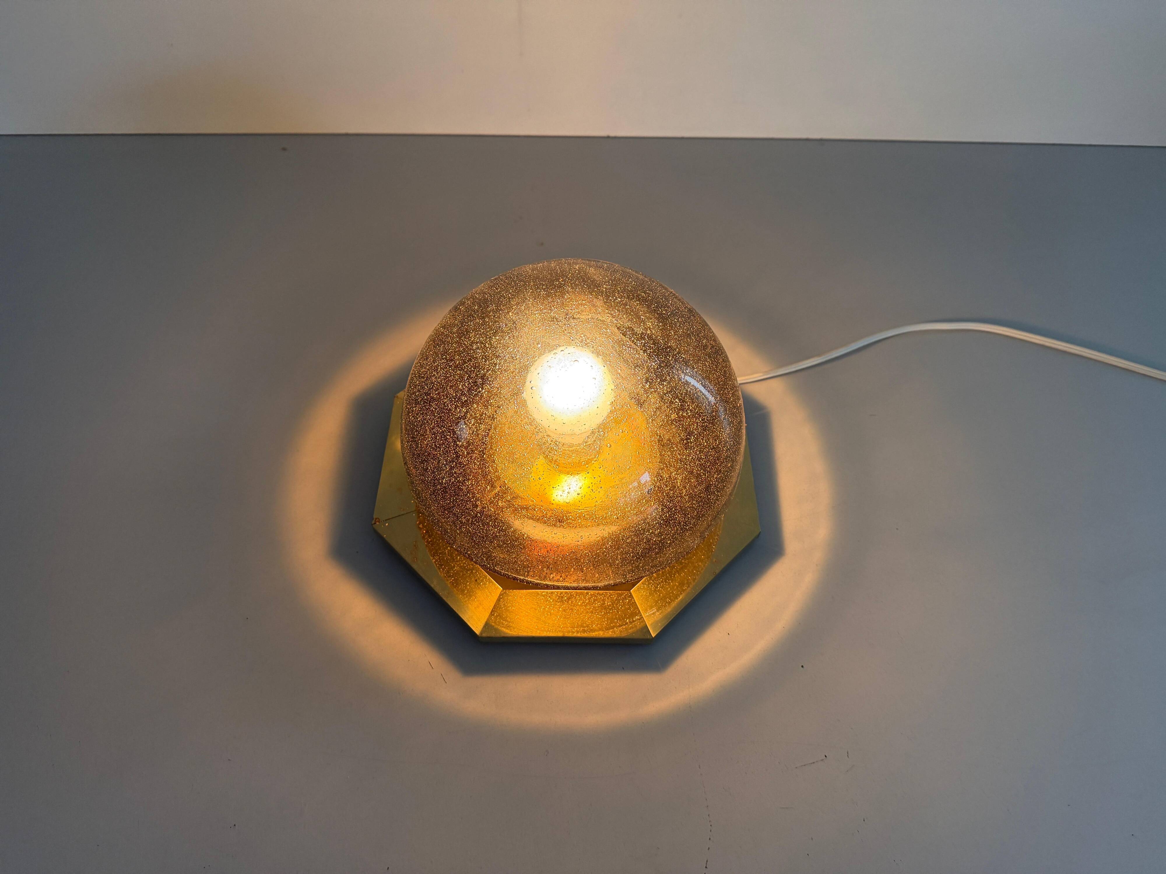 Octagonal ceiling light in brown glass and brass base by Limburg, 1960s, Germany.