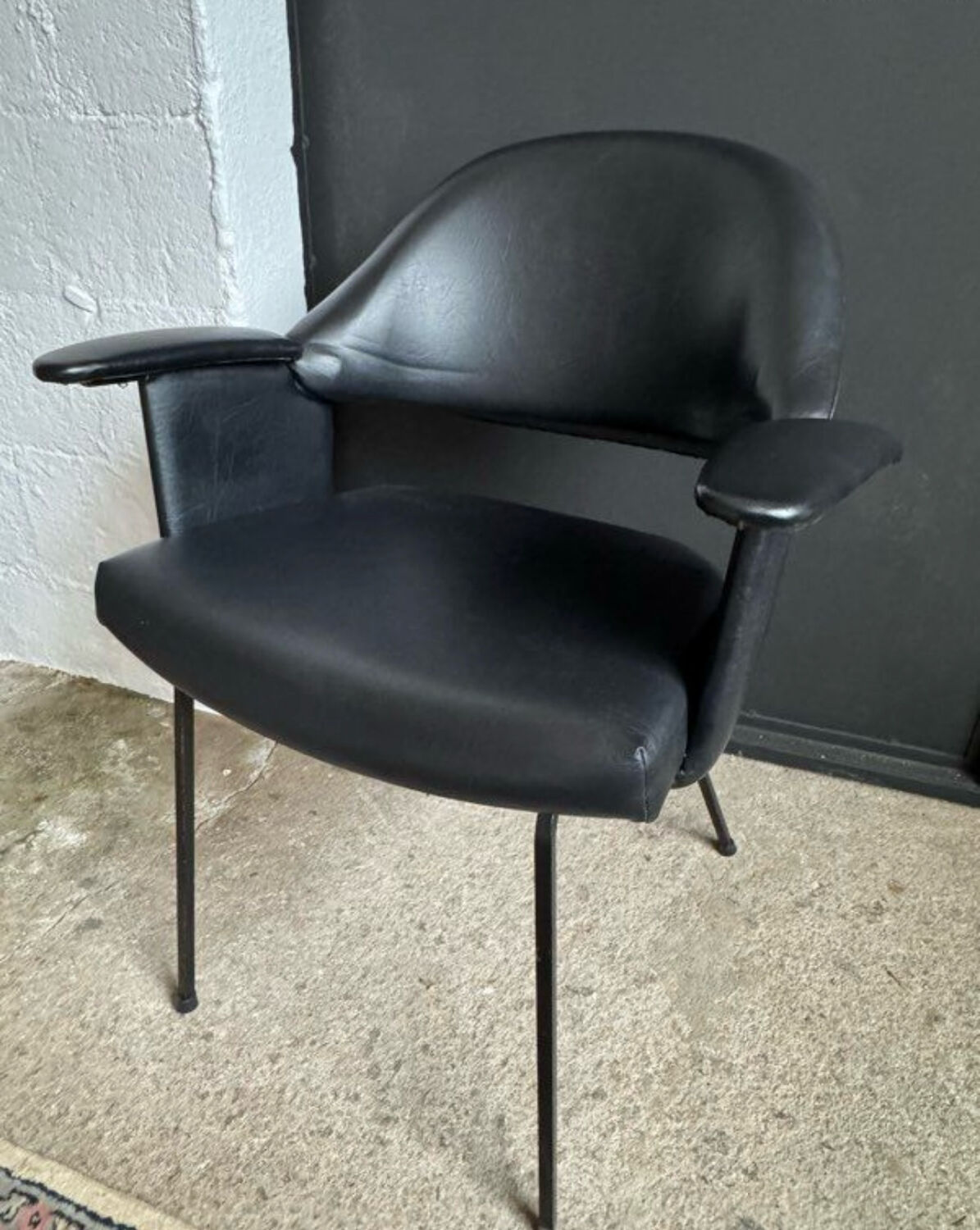 Black armchair from the 1950s