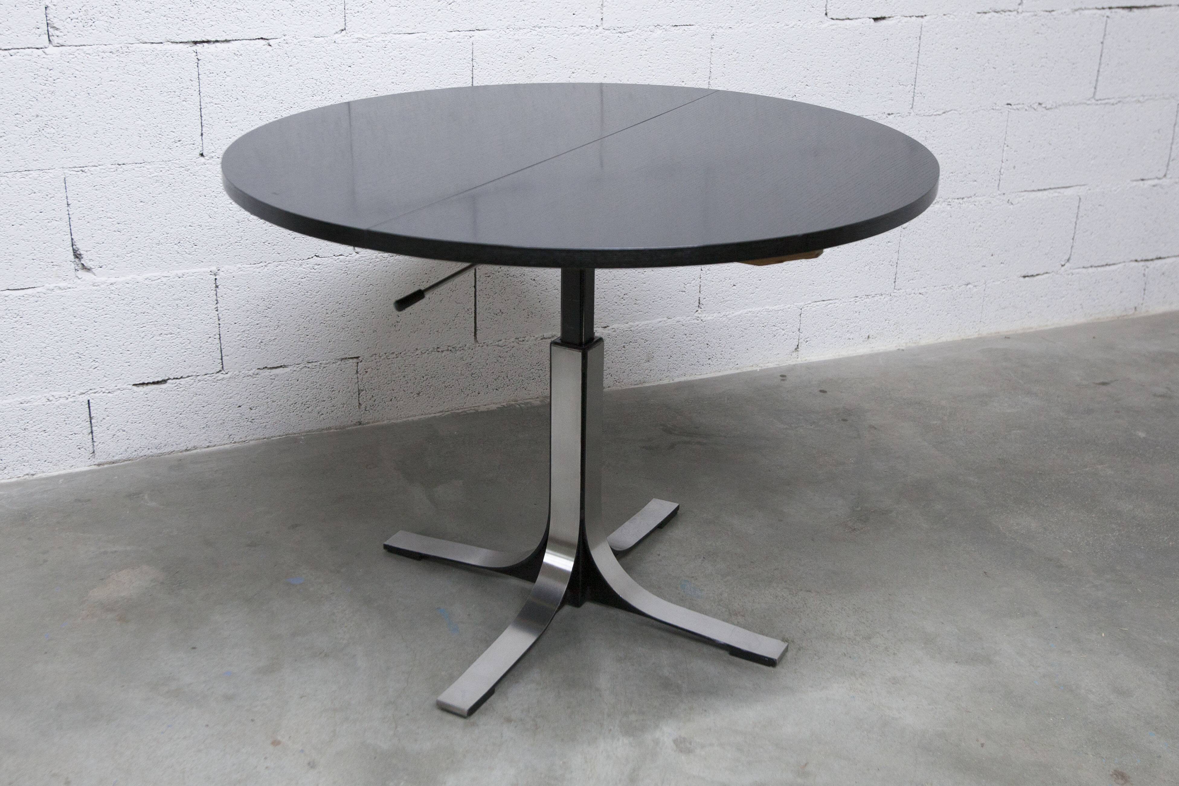 Round table rises and lowers Osvaldo Borsani black and chrome with extension