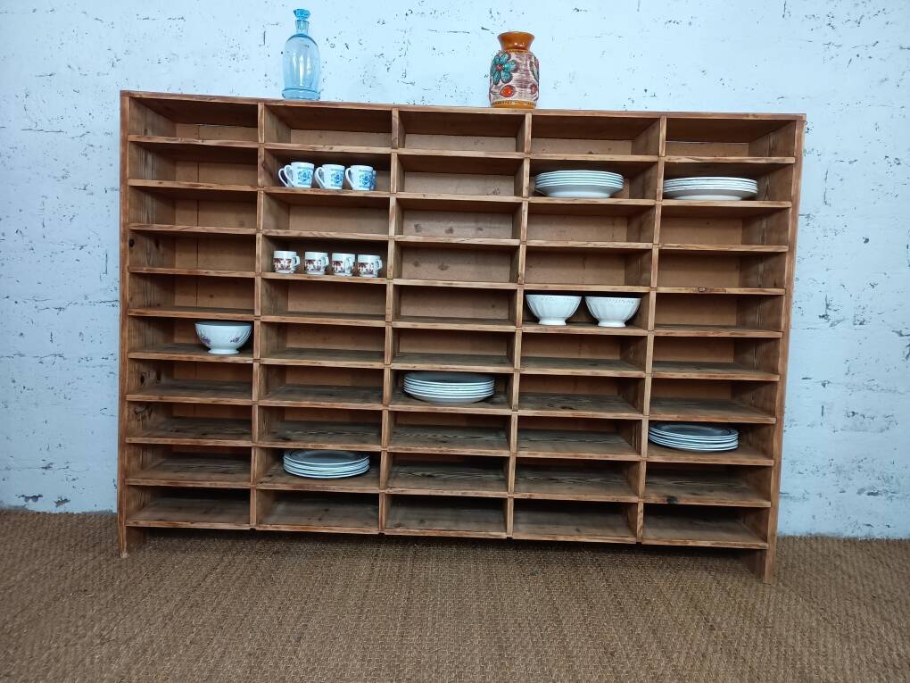 Wooden sorting cabinet with 50 compartments.