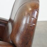 Sheep leather armchair with round shapes