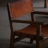 Pair of Spanish brutalist armchairs from the 1960s, wood and leather.