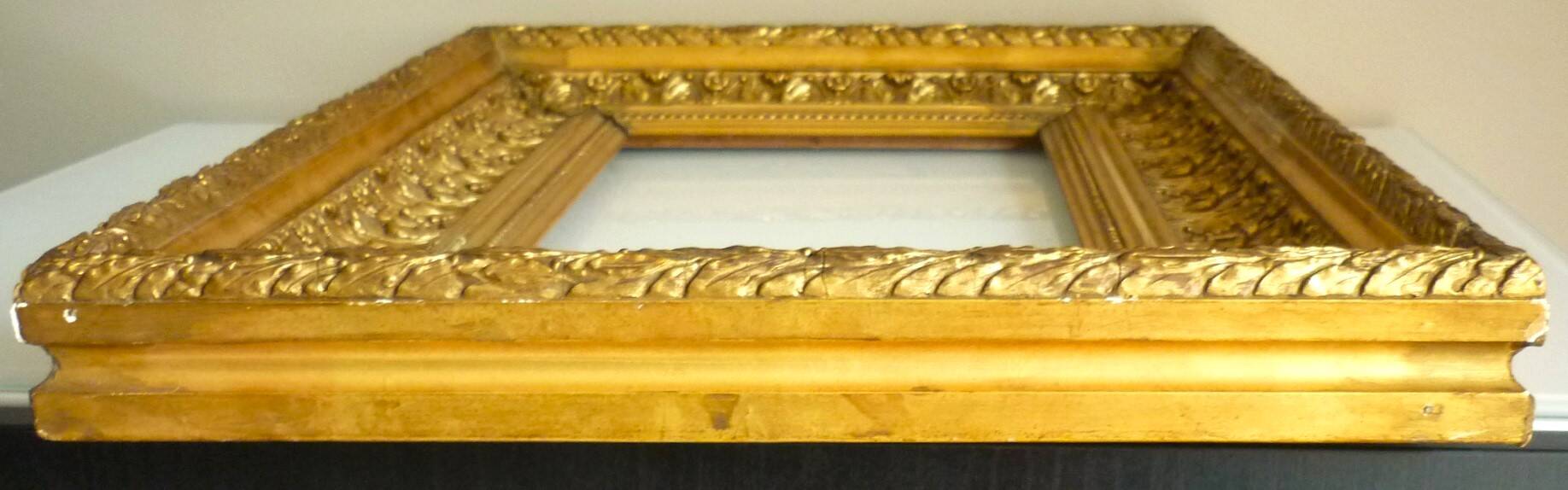 Antique gilded frame in wood and stucco, carved, original gilding