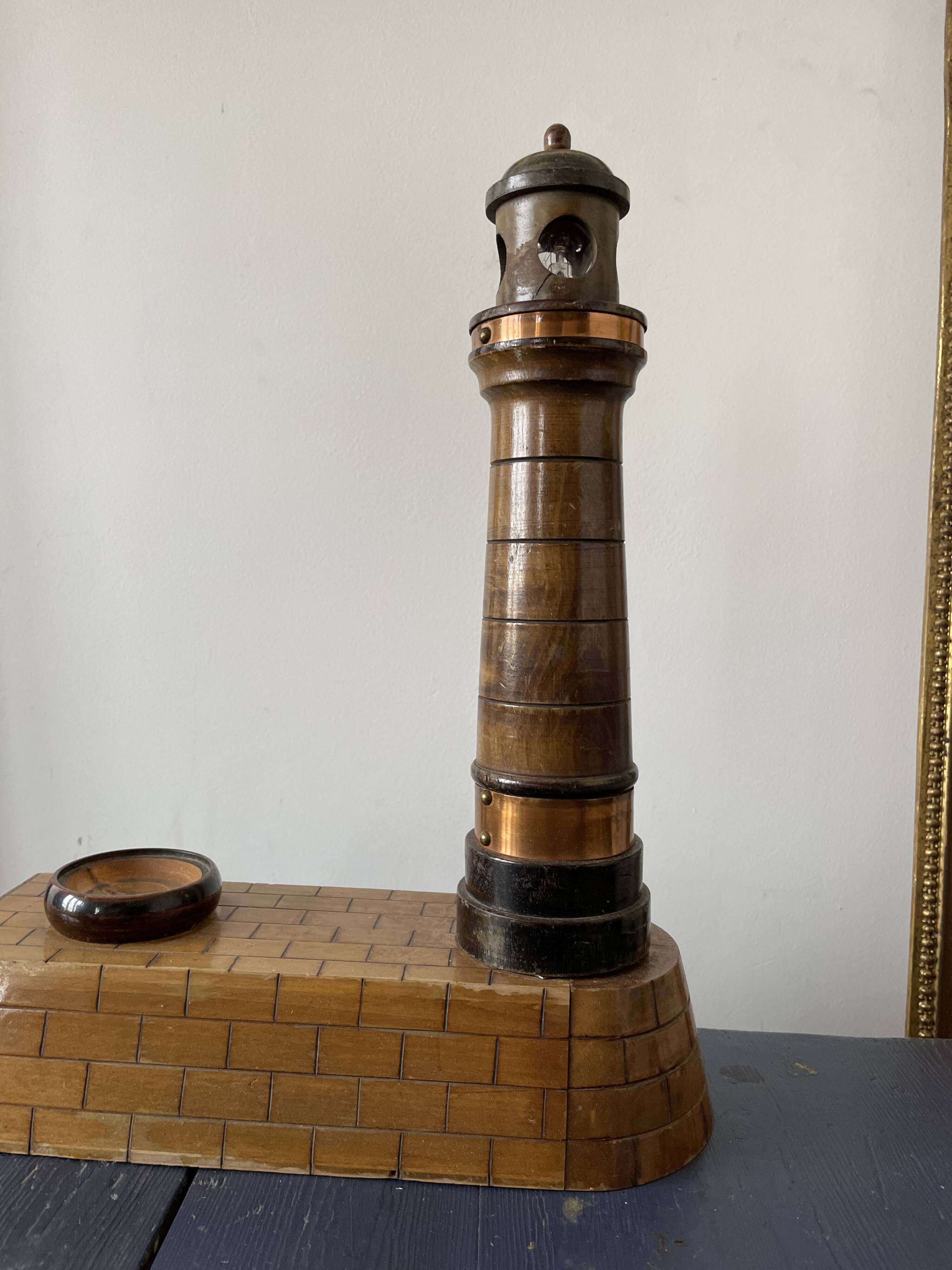 Souvenir lighthouse lamp from Calais in wood