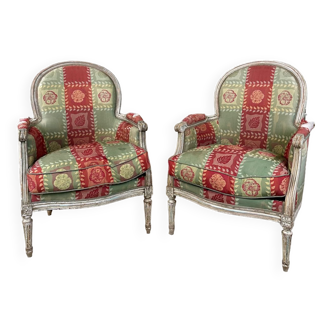 Pair of Louis XVI style armchairs in painted wood