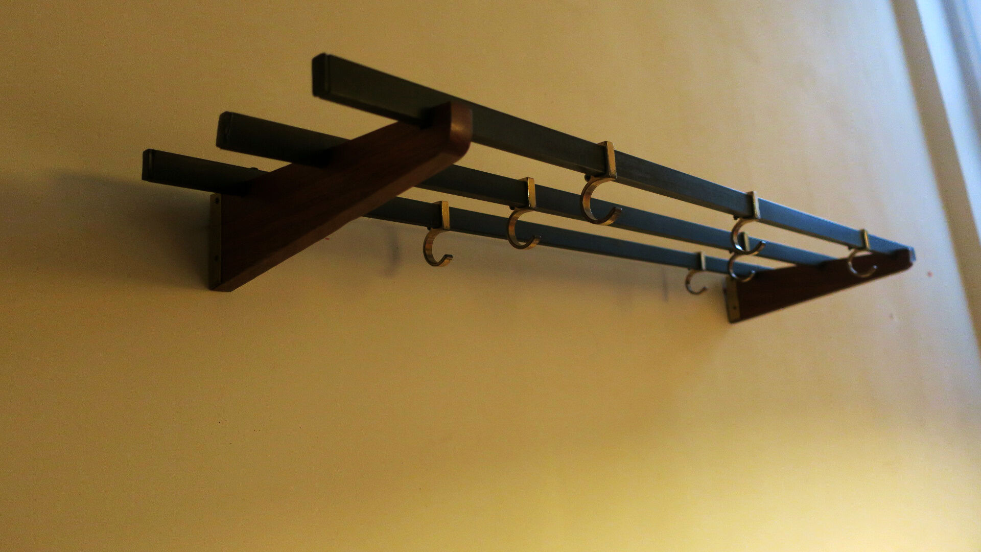 Teak, brass and black metal coat and hat rack, 1960