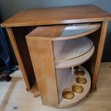 Vintage retractable swivel bar cabinet from the 1950s