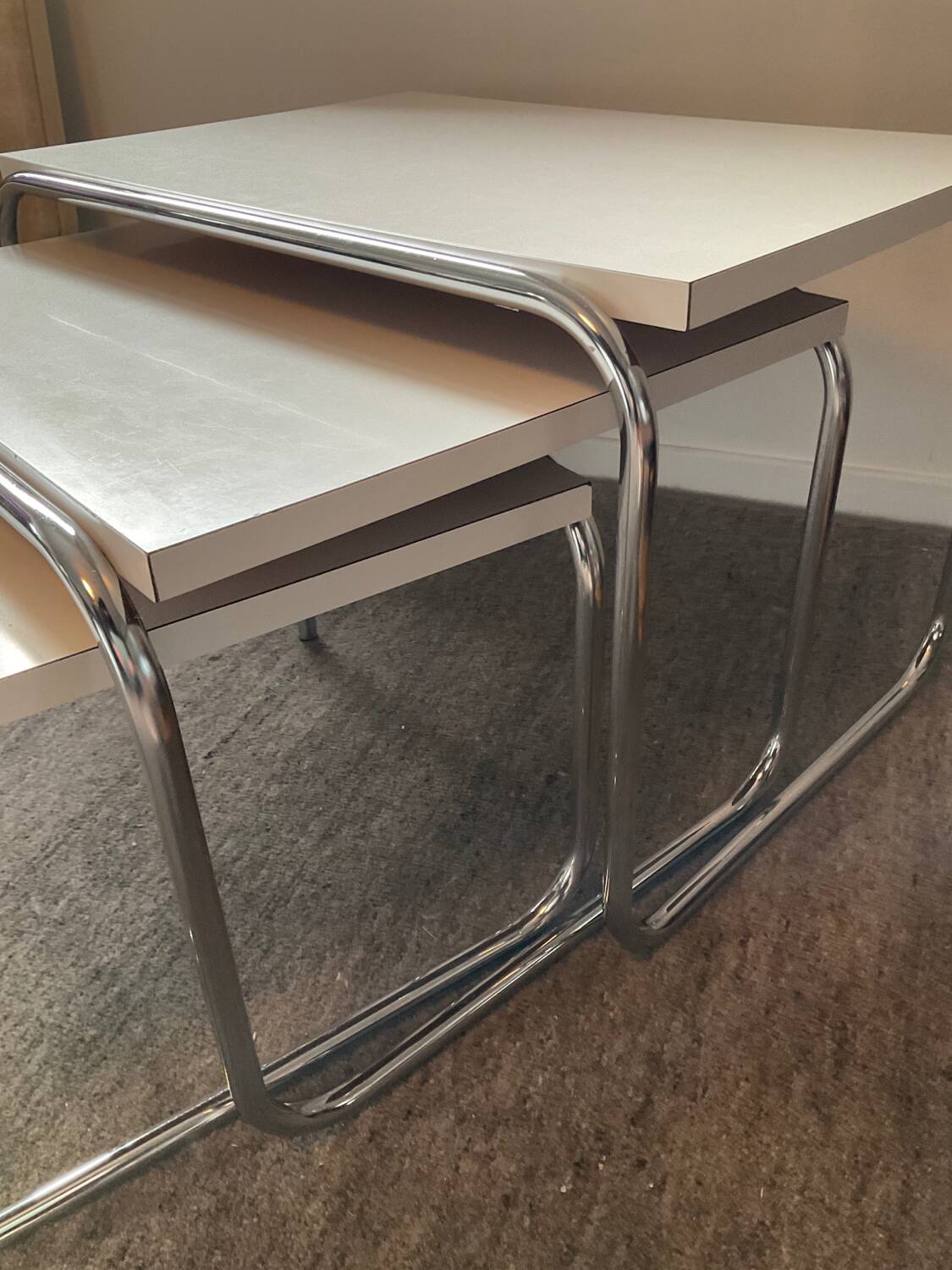 Trio of vintage nesting tables in Formica and chrome metal