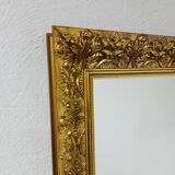 Grand miroir mural vintage sculpté et doré 1970