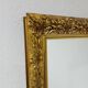 Grand miroir mural vintage sculpté et doré 1970