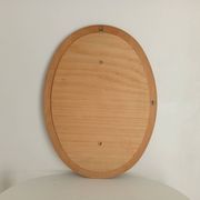 Vintage oval mirror in beech from the 70s/80s.