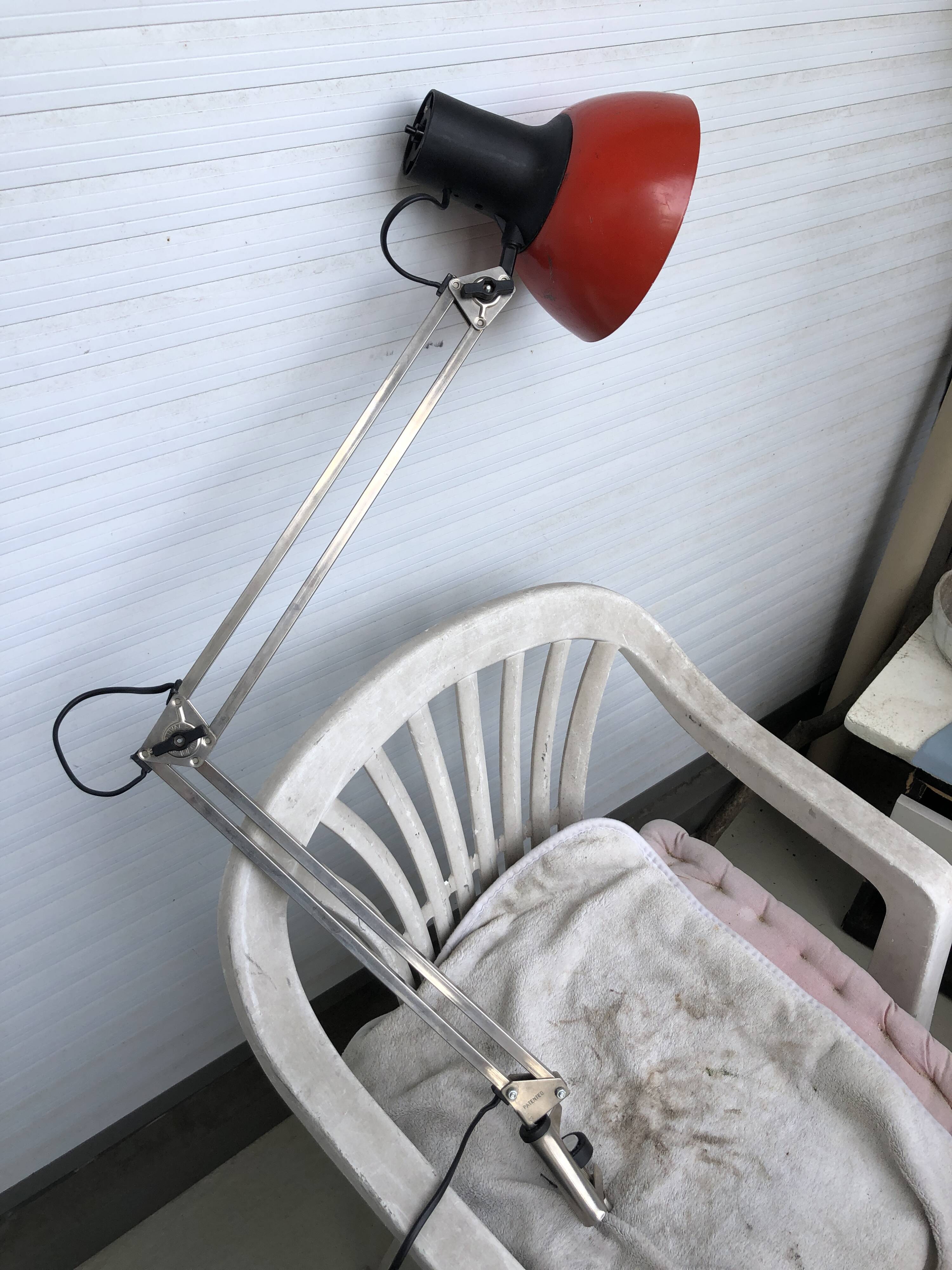 Red architect lamp patented Finland