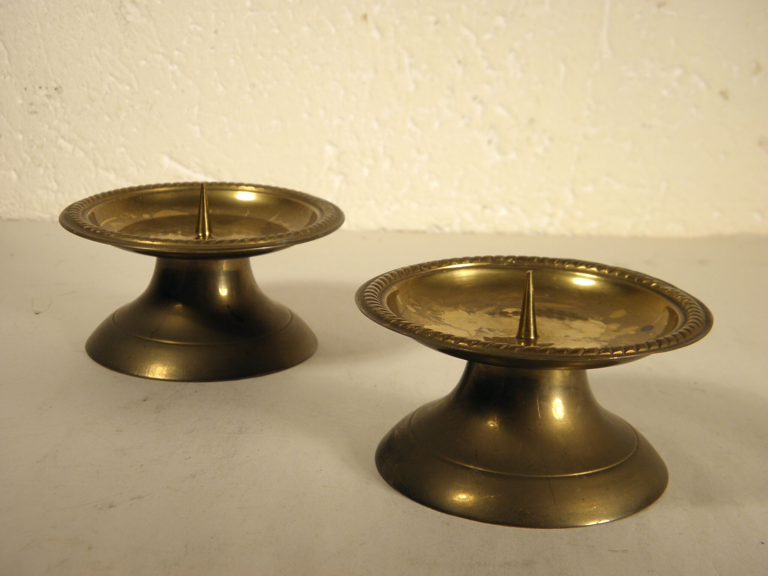 Pair of brass "pique - candle" candlesticks