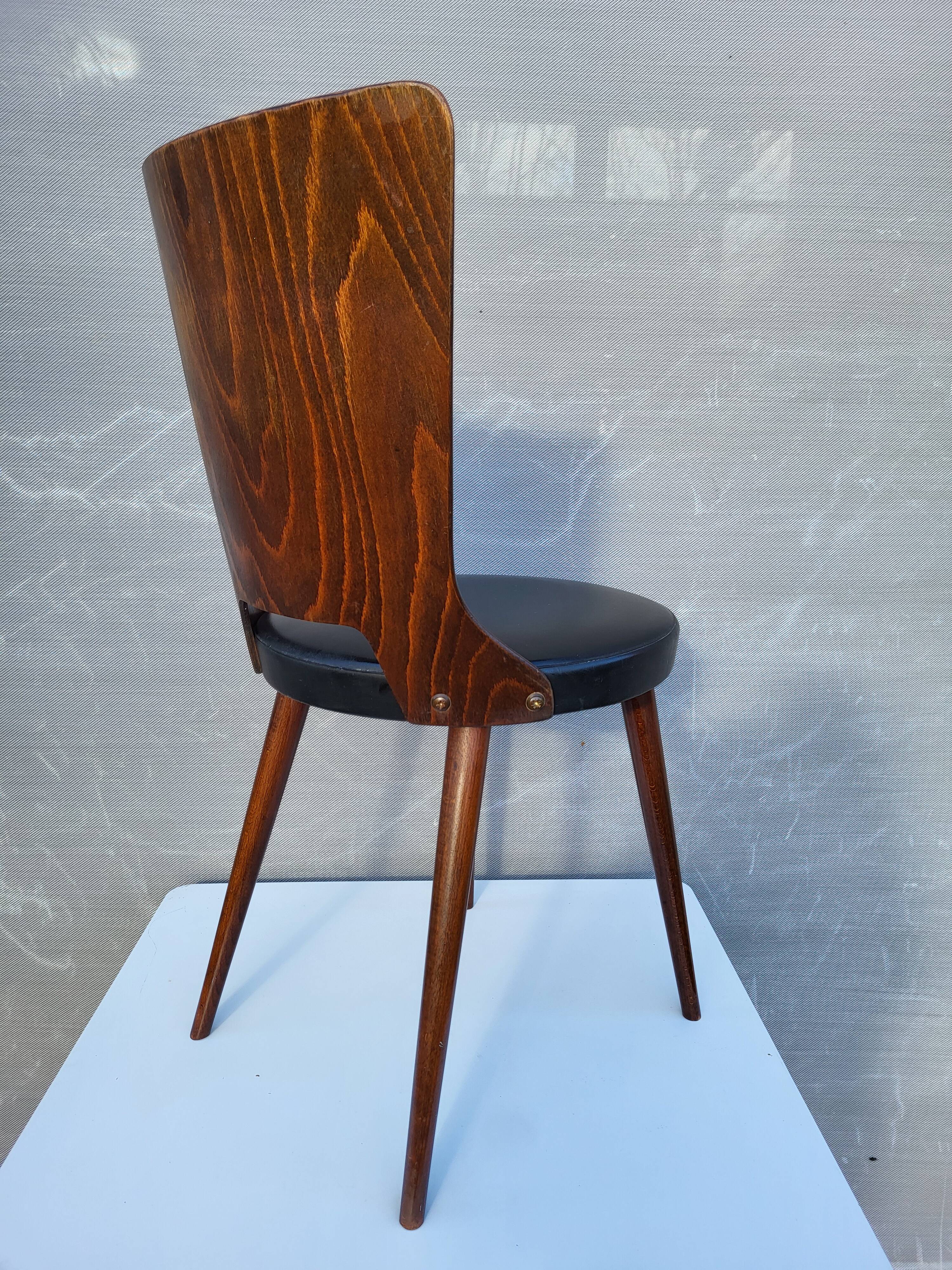 Pair of Dove chairs • Baumann • Black faux leather