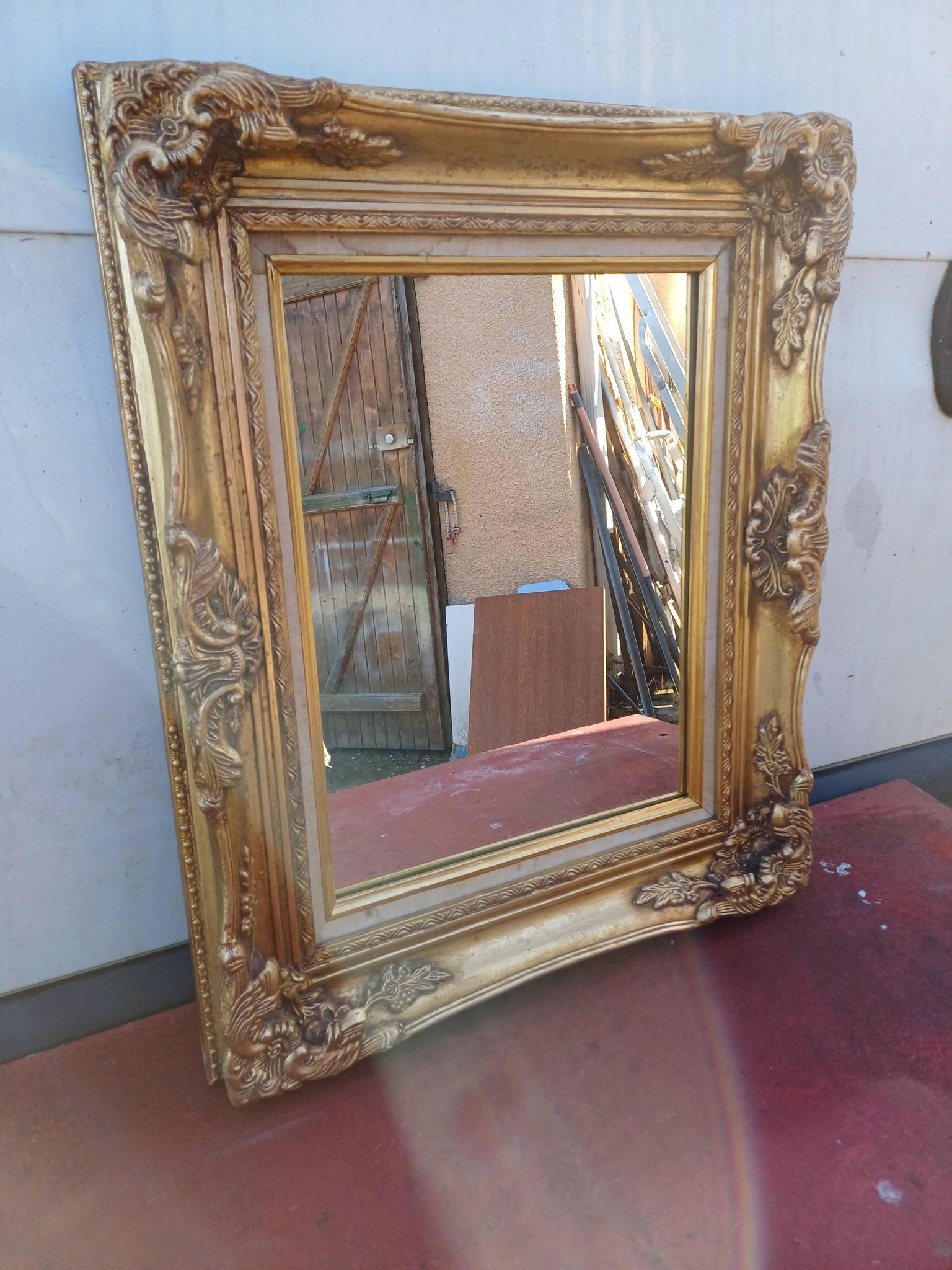 Mirror wood and gilded stucco