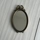 Petit miroir oval ancien