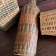 Set of three vintage rattan bottles