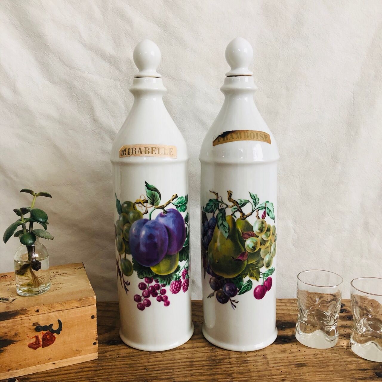 Porcelain bottle duo for mirabelle and raspberry brandy