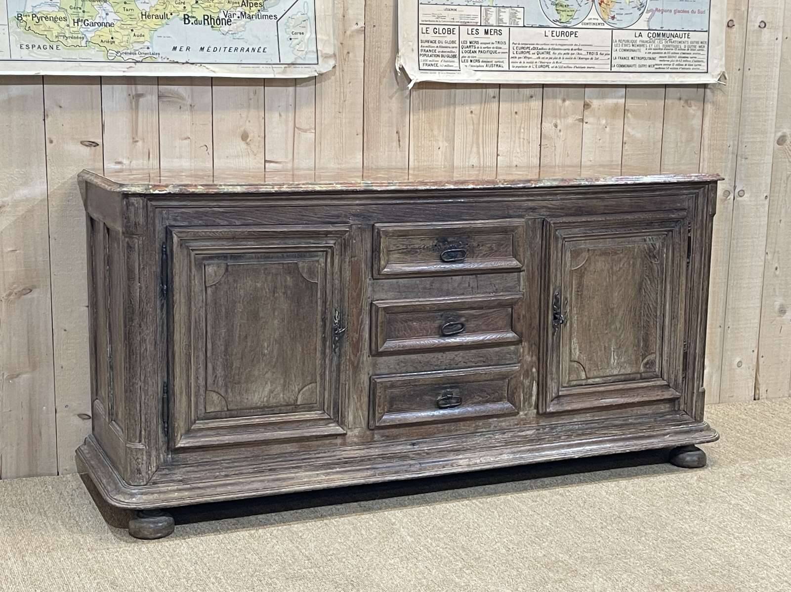 18th-century oak enfilade with a marble-effect painted top.