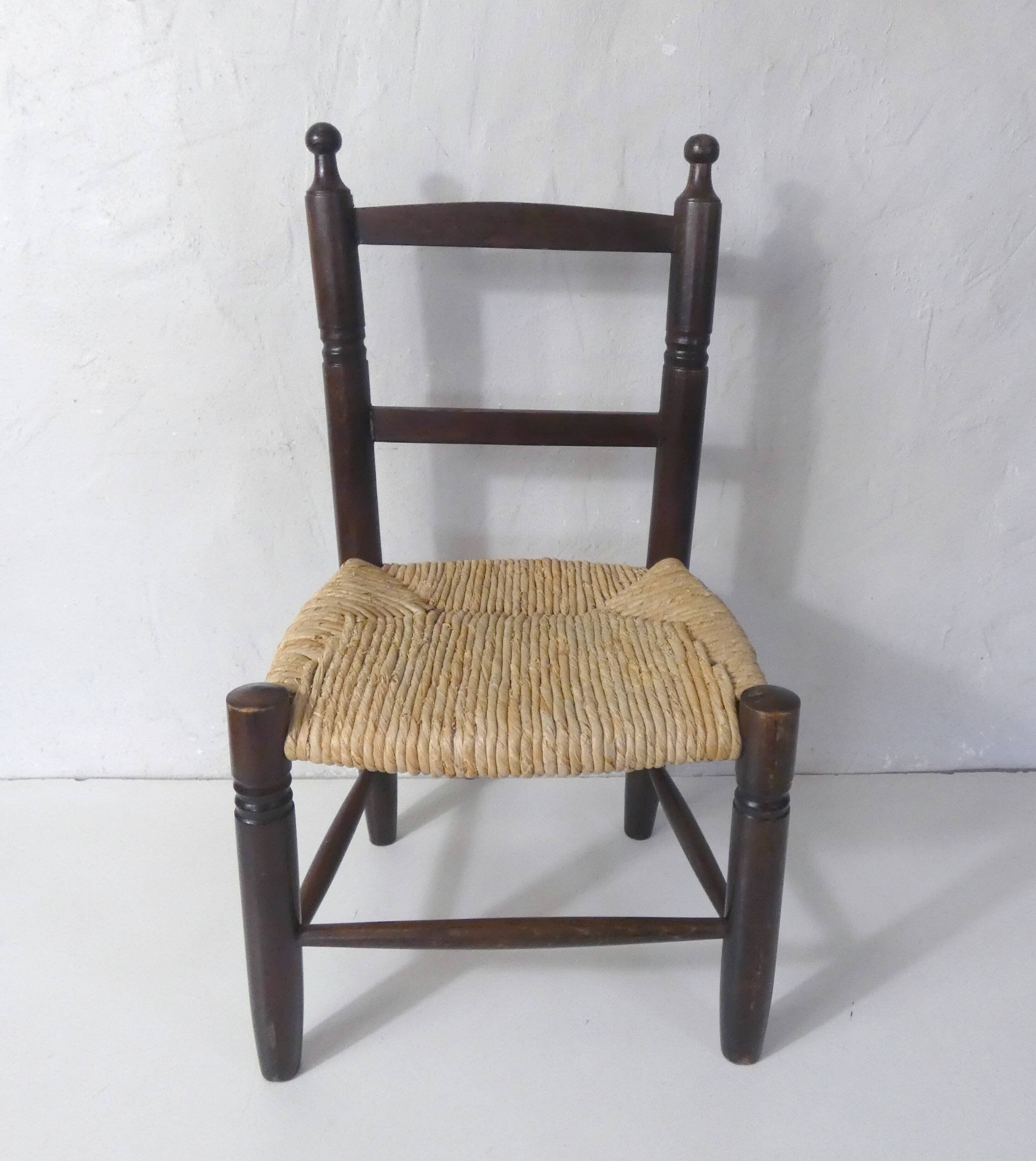old wooden straw chair for children