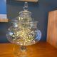Glass jar on pedestal