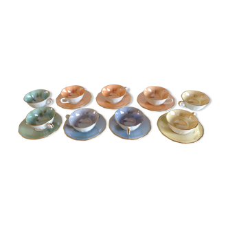 Suite of nine cups in polychrome  ceramic 50/60