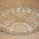 Oval compartmentalized plate in transparent glass