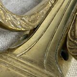 Pair of wall candle holders in bronze