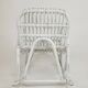 Vintage rocking chair for children in rattan/bamboo.