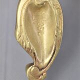 Pair of Louis XV style beveled mirror sconces in bronze by Lucien Gau