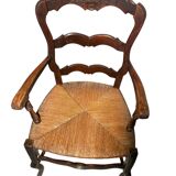 Fauteuil provençal ancien en bois sculpté avec assise en paille
