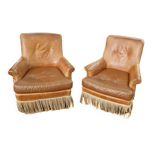 Paire fauteuils en cuir