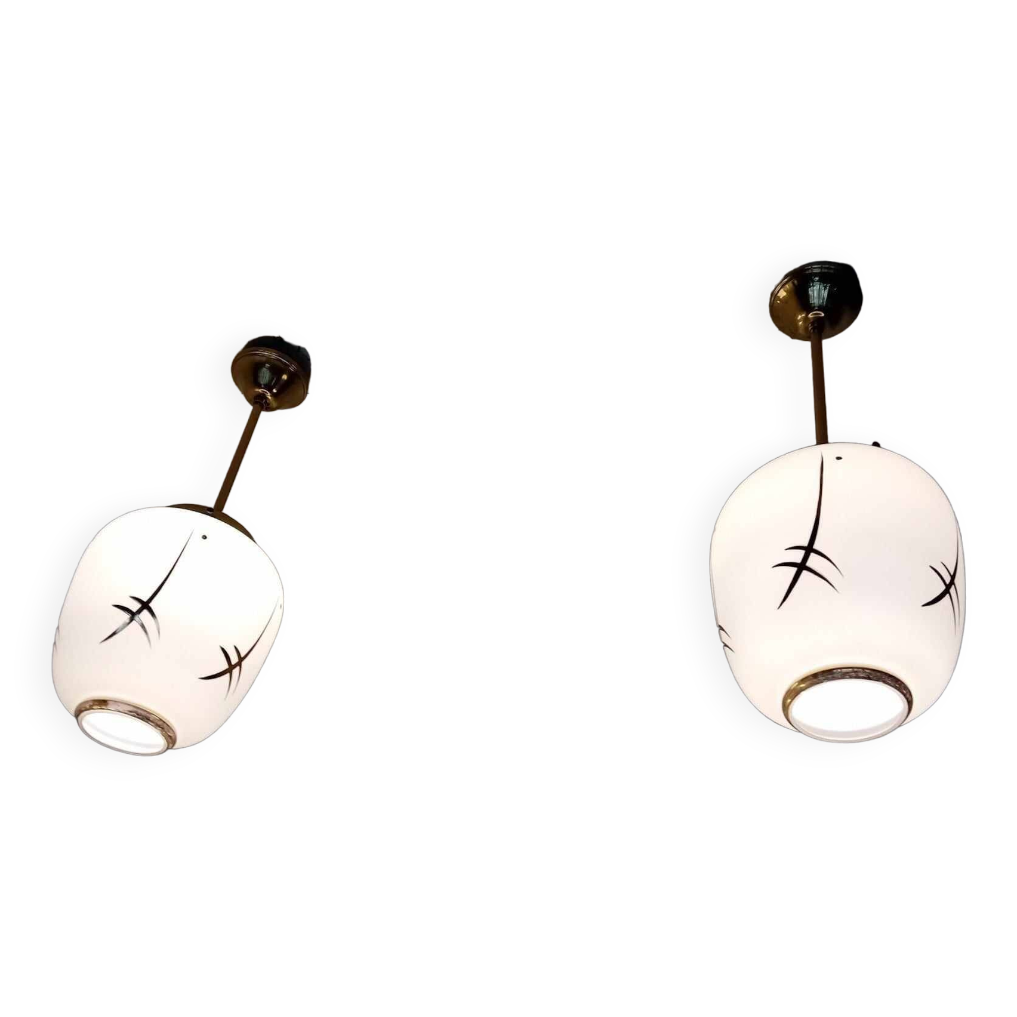 Pair of opaline globe pendant lights with stylized decoration, 1950s