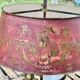 Bronze-gilt bouillotte lamp XIXth century with a tin shade featuring Japonese decoration.