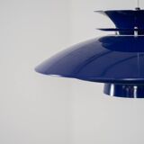 Elegant blue pendant light by Belux