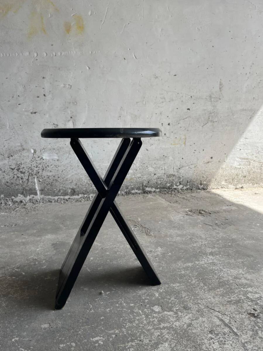 Suzy folding chair by Adrian Reed — Brown wooden mid-century minimalist folding chair, compact X-frame