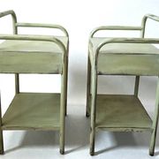 Copy of a pair of patinated metal bedside tables.