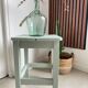 Antique almond green wooden stool