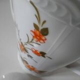 Vintage coffee pot Winterling Bavaria with orange floral decoration.