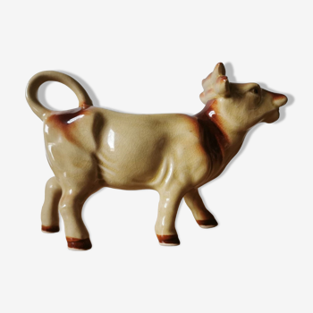 Old cow-shaped milk pot