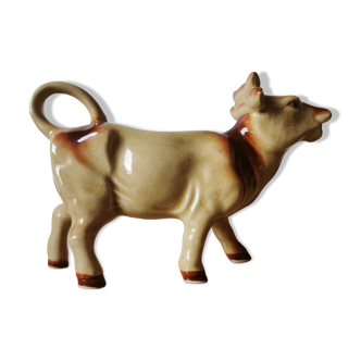 Old cow-shaped milk pot