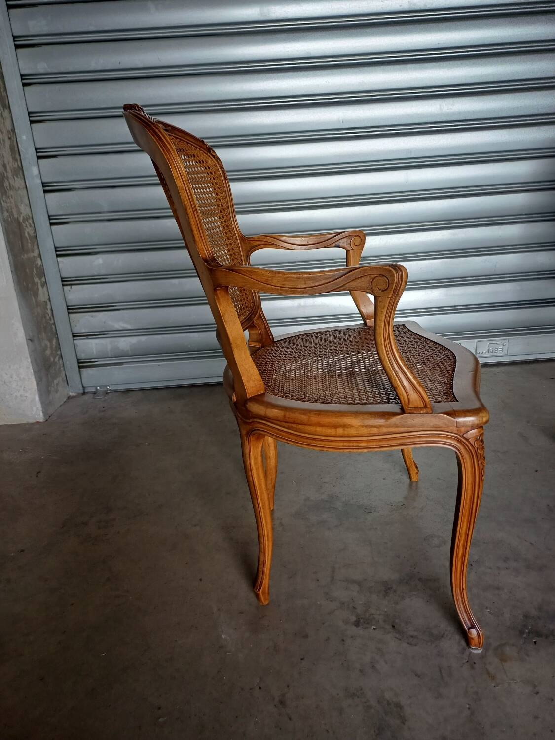 Pair of caned cabriolet armchairs