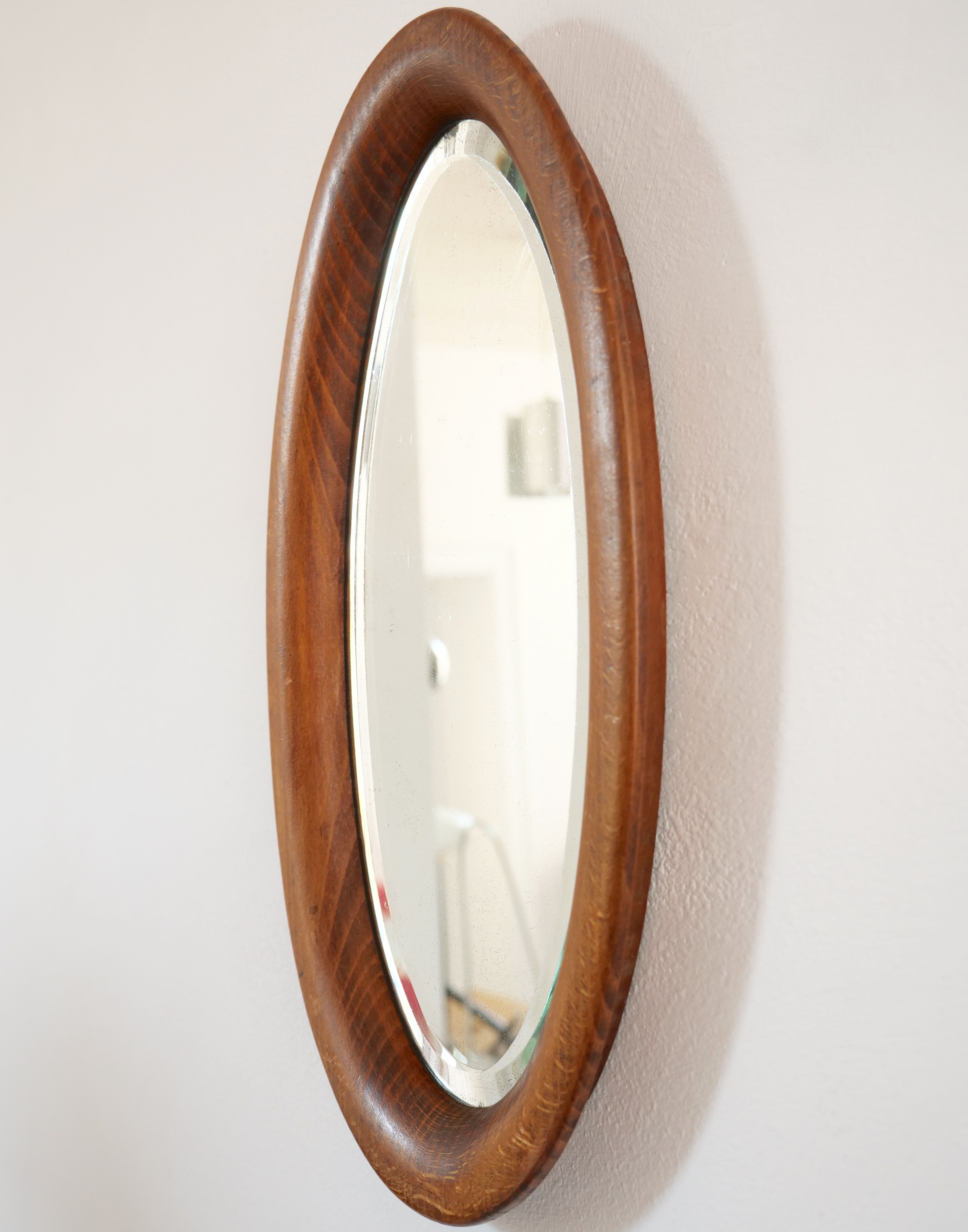 Oval mirror in artisan wood 28x49cm
