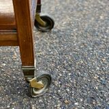 Vintage retractable tea trolley on wheels