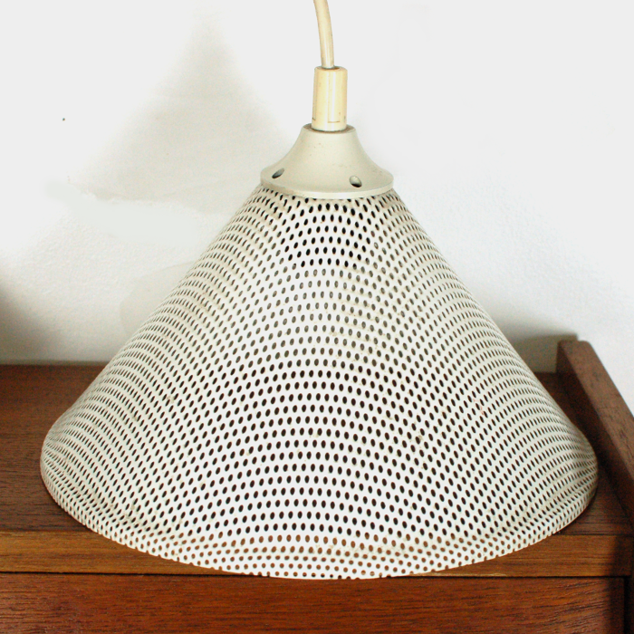 Perforated white metal hanging lamp